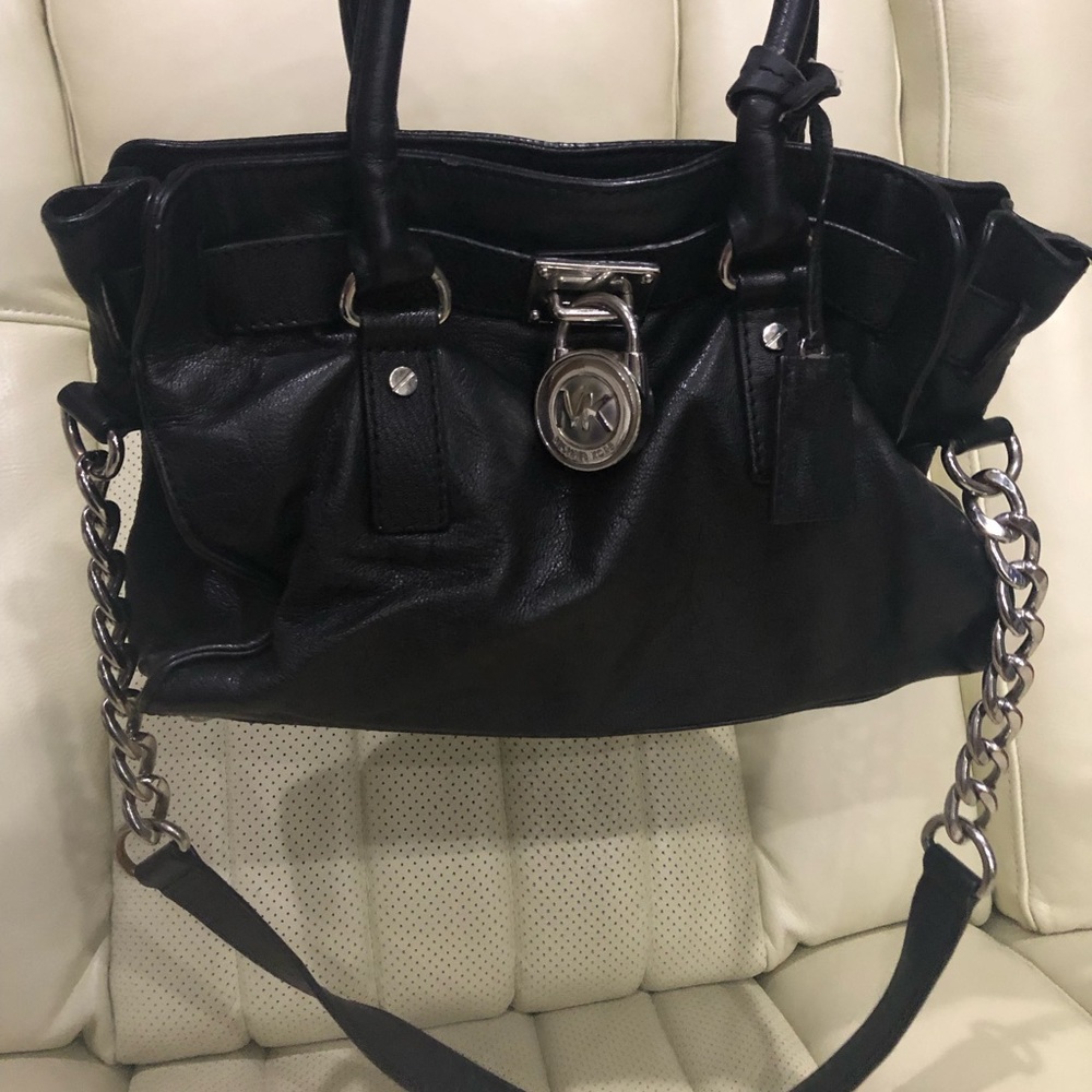 Michael Kors classic medium sized black leather handbag.